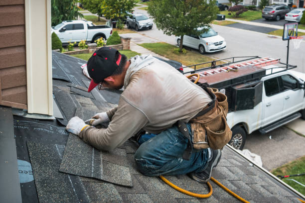 Professional Roof Replacement technician working in Rimforest, CA